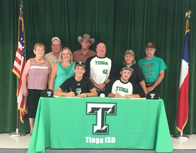 Picture of Tioga seniors Cade Gibson and Isaac Sloane signing to play baseball with Oklahoma Wesleyan
